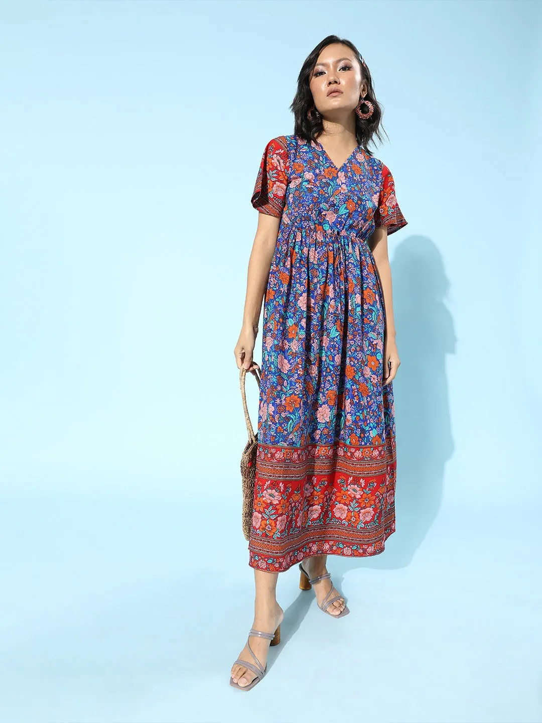 Berrylush Women Blue & Red Floral Printed V-Neck Front Knot Flared A-Line Maxi Dress