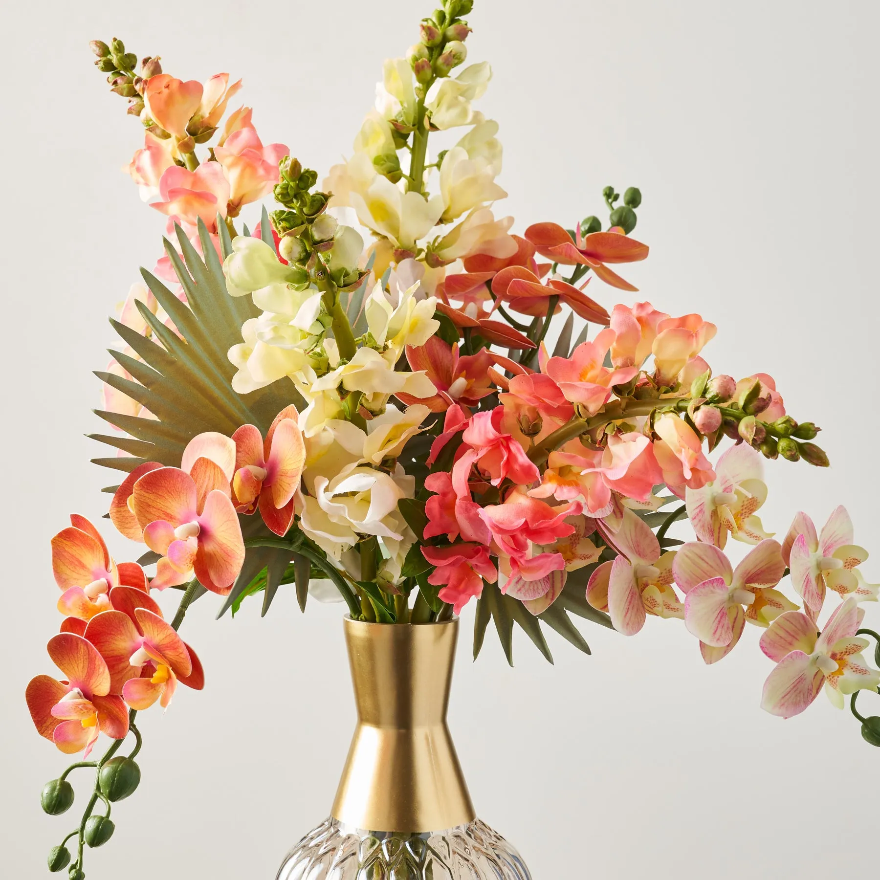 Coral Calypso - Tropical Orchid, Ombre Snapdragon & Fan Palm In Smoke Glass Gold Dip Bottle Vase Water Illusion