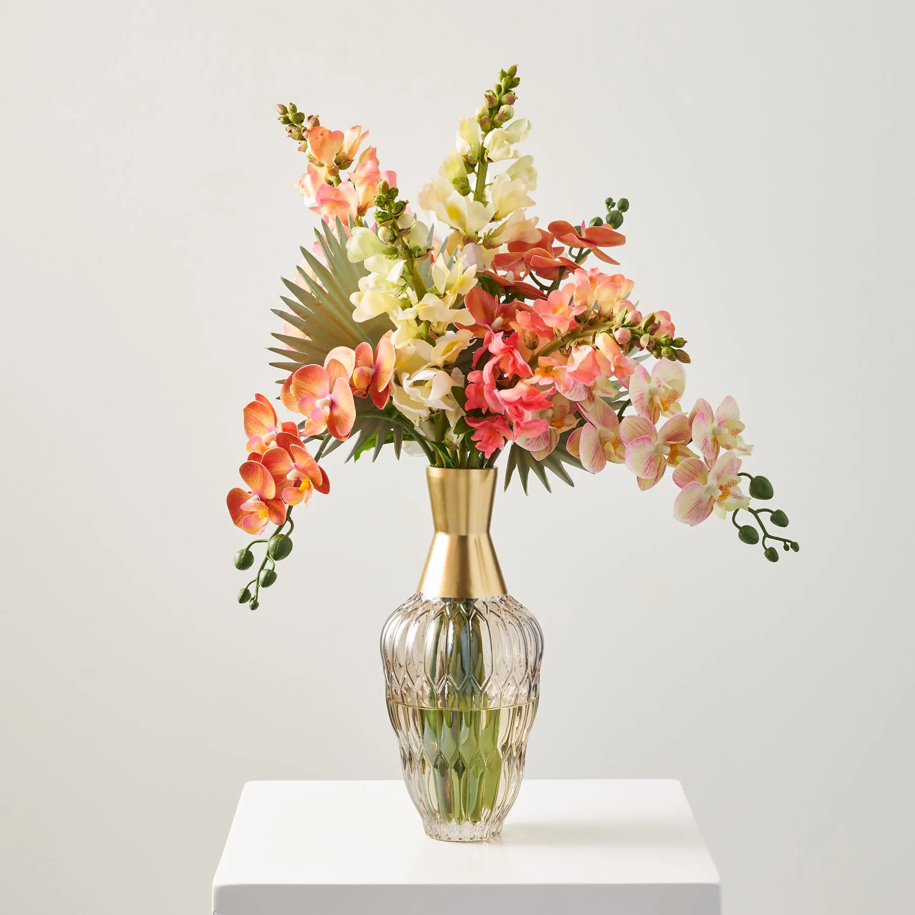 Coral Calypso - Tropical Orchid, Ombre Snapdragon & Fan Palm In Smoke Glass Gold Dip Bottle Vase Water Illusion